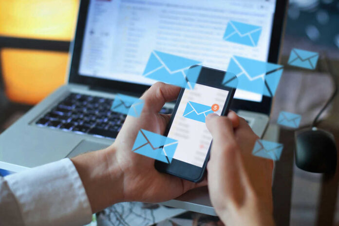 Email,Marketing,Concept,,Person,Reading,E-mail,On,Smartphone,,Receive,New