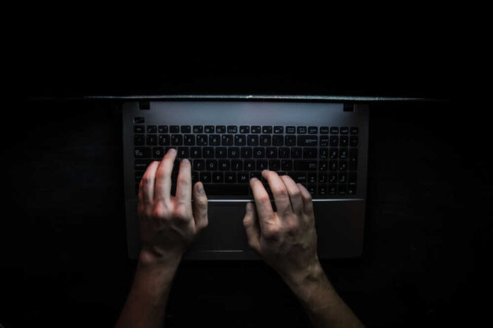 Russian,Hacker,Hacking,The,Server,In,The,Dark