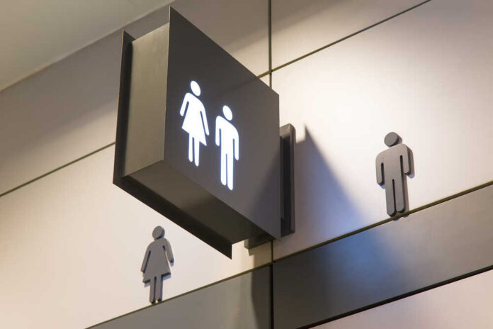 Restroom sign indicating male and female facilities