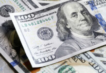 Several US one hundred dollar bills