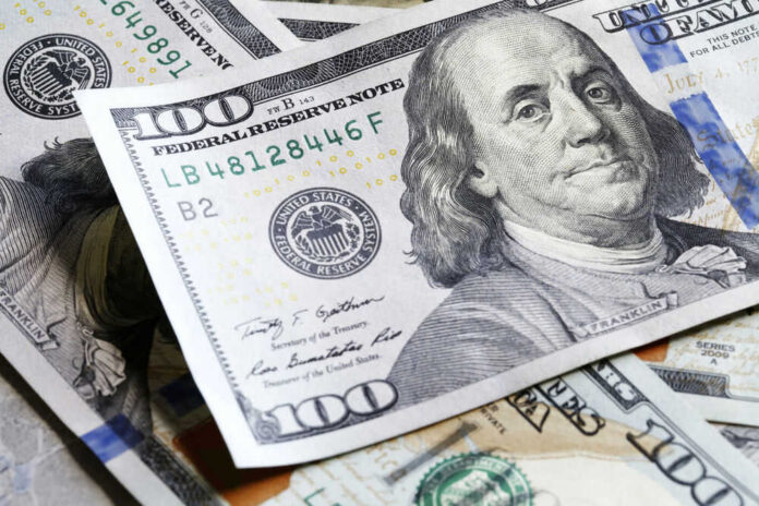 Several US one hundred dollar bills