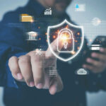 Person interacting with digital security lock hologram.