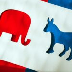 Cutout shapes of a red elephant and a blue donkey on a white background