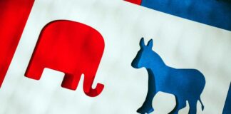 Cutout shapes of a red elephant and a blue donkey on a white background