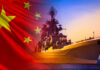 Chinese naval warship at sea with national flag overlay