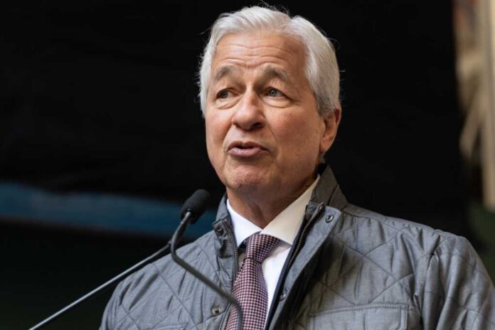 Business leader speaking at a conference wearing a quilted jacket