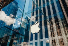 Businesses FLEE As Crime PARALYZES Suburbs Apple store glass building with cloudy sky reflection