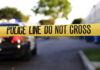 Yellow police tape with text police line do not cross