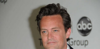 Close-up portrait of a man in a suit at a formal event