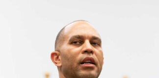 A government official speaking at a press conference