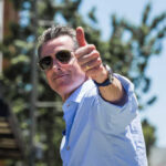 Fox News Under Fire: Did They Cross the Line? Man giving a thumbs up while wearing sunglasses