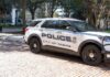 Police car parked on a brick street in Tampa
