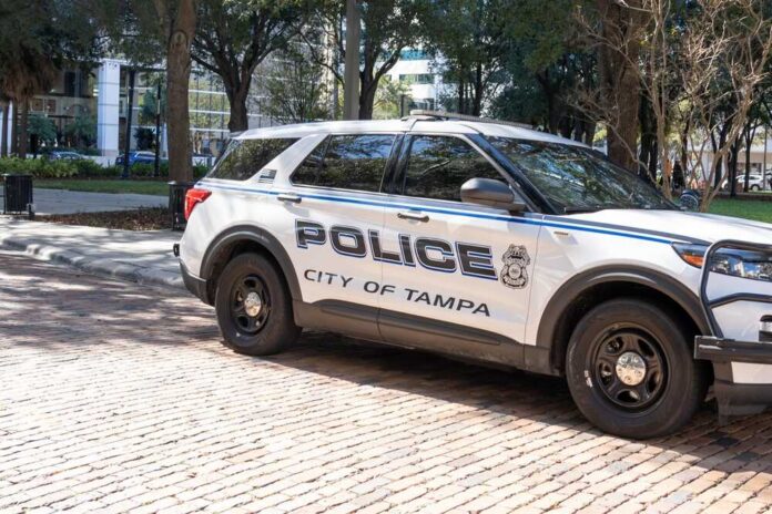 shutterstock_2243001797.jpg Police car parked on a brick street in Tampa