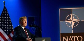 U.S. president delivering a speech at a NATO summit
