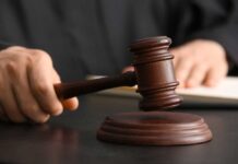 No Prison?! LA Counselor’s Abuse Deal Stuns A judge's hand holding a gavel above a wooden block