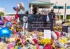 Defense Pushes Secrecy in Charlie Kirk Assassination Empty blurred courtroom with wooden interior usa flags