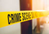 How Did We Get Here? Daughter Murdered Both Parents for Blocking Gender Surgery Yellow crime scene tape with the words 'CRIME SCENE DO NOT CROSS'