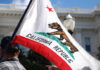 873,000 Ghost Voters Swamp California Rolls California state flag being held up at an outdoor event