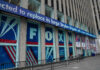 China Hysteria Exposed—FOX Walks It Back Fox News building exterior with ticker and barricades