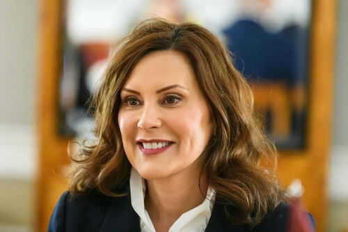 gretchen-whitmer Person smiling indoors with blurred background