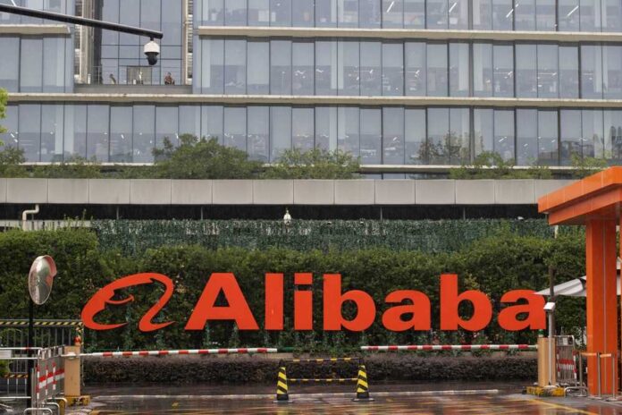 Hangzhou,,China,-,Sep,14,,2023:,Alibaba,Group's,Global,Headquarters, Business team in conference room with digital data overlays