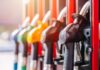 Colorful fuel nozzles at a gas station