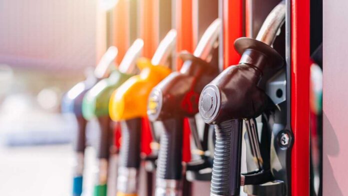 Colorful fuel nozzles at a gas station