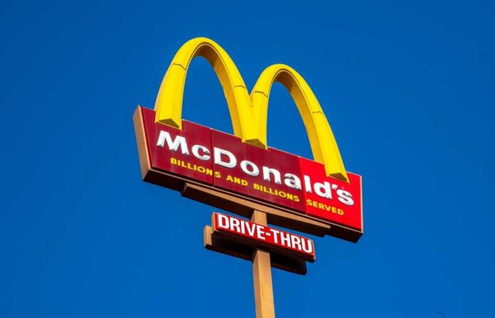 McDonald's restaurant sign with drive-thru indication