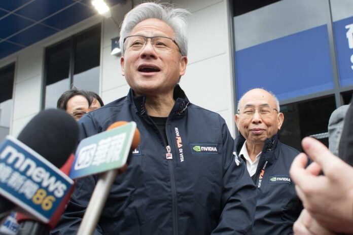Jensen,Huang,,Nvidia,Founder,And,Ceo,And,C.w,Tsai,,Spil Technology leaders speaking at a press conference