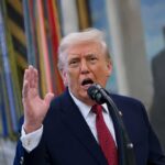 Trump Torches ‘Godless’ Left Surge A man speaking passionately into a microphone with his hand raised
