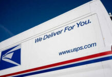USPS delivery truck with logo and slogan visible