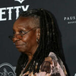 Live TV Backfire: Whoopi Gets Schooled Person with dreadlocks smiling and wearing glasses.