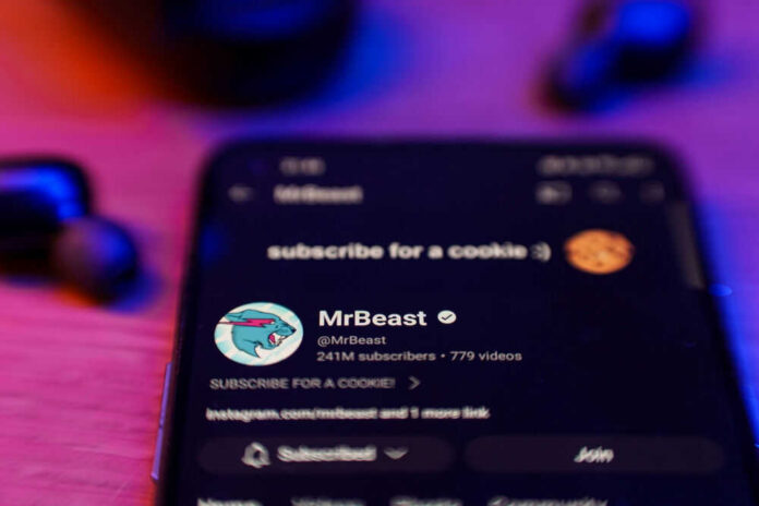 youtuber-mrbeast_id_2432505495 Phone screen showing MrBeasts YouTube channel page.