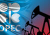 OPEC Shaken: UAE Opens the Taps OPEC logo in front of an abstract flag background with oil rigs silhouettes