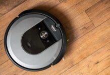 China-Linked Roombas Hit a Wall robot vacuum on hardwood floor