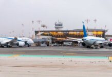 U.S. Warplanes Hijack Israel’s Main Airport Airplanes parked at Ben Gurion Airport with terminal in the background