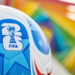 Bellingham Explodes — London Loses It Close-up of a FIFA World Cup soccer ball with a colorful background