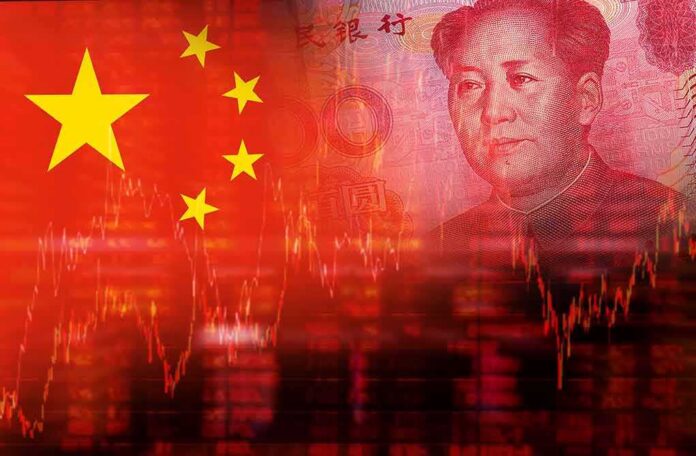Chinese flag overlaid with yuan banknote and stock market graph