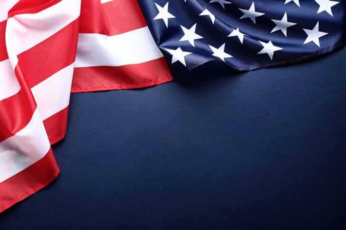 shutterstock_1068969920 American flag fabric draped with space for copy
