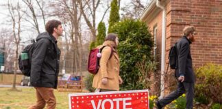 Voters walking into a polling place