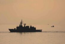 Mines Cleared—What’s Hiding Beyond The Lanes? naval ship silhouette at sea during sunset