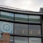Curved glass facade of a modern office building