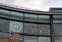 Curved glass facade of a modern office building