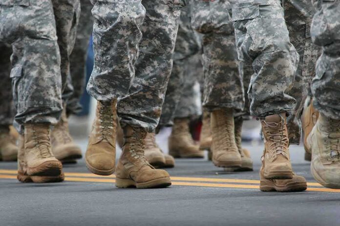 soldiers' boots marching on a road