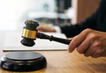 Judges Torch Shaky Assault Cases Judge's hand holding a gavel over a sound block