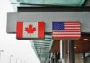 Canada Tilt? Trump Preps Heavy Tariffs Canadian and American flags displayed at a border crossing