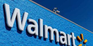 Walmart storefront sign on bright blue exterior wall