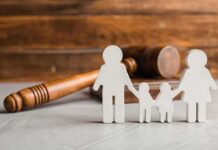 Virginia Crackdown Turns Parenting Into Crime Paper cutout family with gavel in background