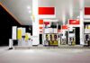 Diesel Shock Slams Wallets Nationwide Gas station fuel pumps at night