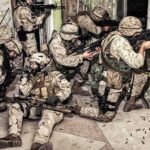 Late-Night Tip Triggers Major Lockdown soldiers in camouflage gear take positions inside a damaged building